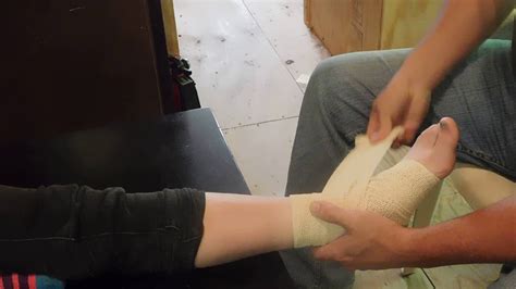 The Right Way To Wrap A Sprained Ankle With An Ace Bandage Youtube