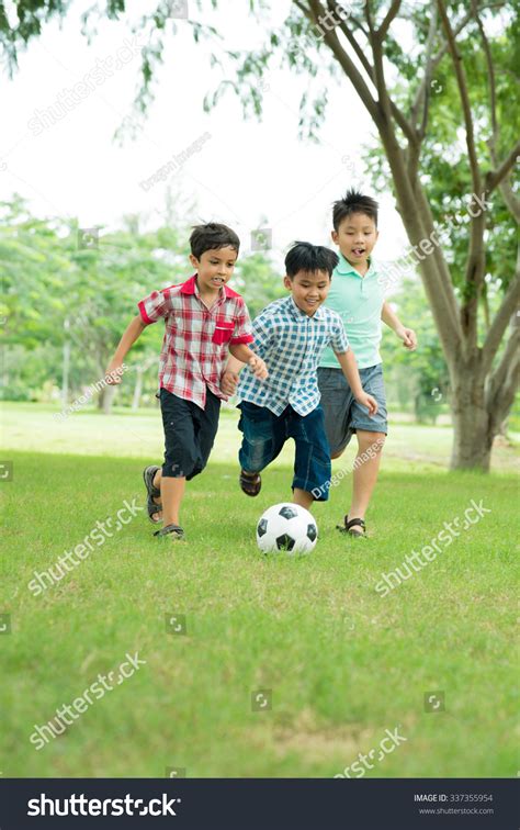 Little Boys Playing Soccer Park Stock Photo Edit Now 337355954