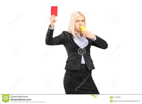 Angry Businesswoman Blowing A Whistle And Showing A Red Card Stock