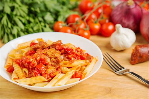 Cook until the onion is soft. Spanish Pasta With Chorizo and Tomato Sauce Recipe