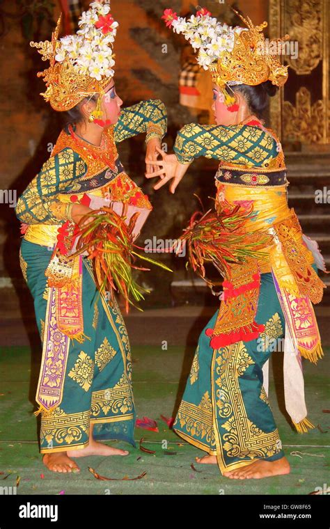 Two Balinese Dancers Performing In Ubud Bali Indonesia Stock Photo
