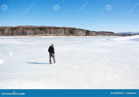 Man Walking On A Frozen Lake Stock Image Image Of Explorer Male
