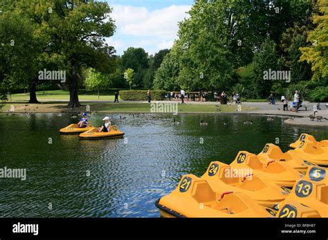 Children Having Fun In The Childrens Boating Lake In Regents Park