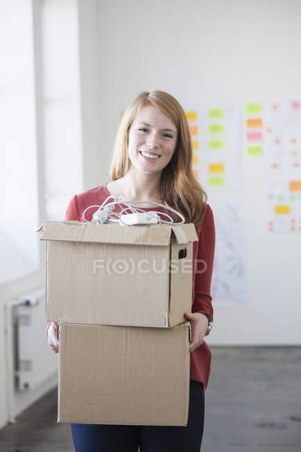 Woman Carrying Cardboard Boxes — Business Smiling Stock Photo