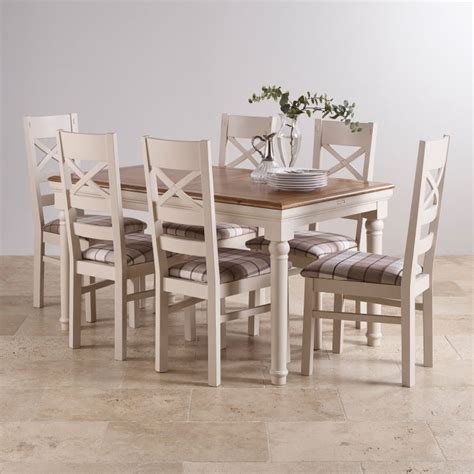 An oak table and chairs can refresh your home's decor beautifully. Shay Dining Table Set in Painted Oak + 6 Brown Check Chairs