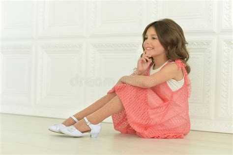 Beautiful Happy Girl Sitting On The Floor At Home Stock Photo Image