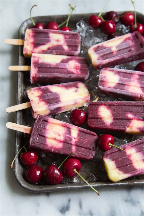 After leaving your popsicles in the freezer for several hours, or even overnight, we just can't wait any longer. Swirled Cherry Pineapple Popsicles - The Little Epicurean