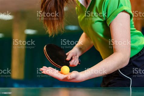 Black Ping Pong Paddle And Ball In Female Hands Close Serve The Ball In