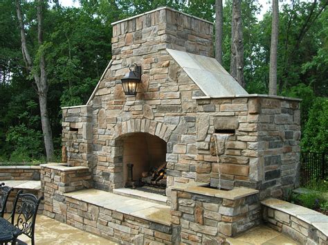 Outdoor Stone Fireplace Warming Up Exterior Space Traba