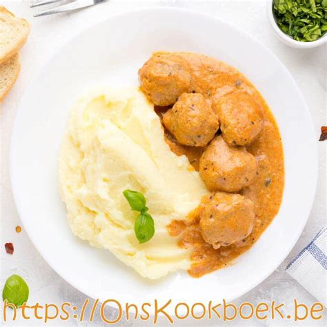 Meatballs And Mashed Potatoes On A Plate With Bread Parsley And Herbs
