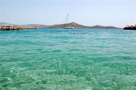 Turquoise Aegean Sea Near Beach Of Luxury Hotel With Yacht View