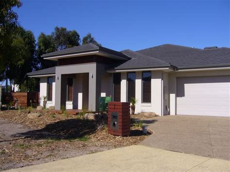 As townsville's leading roof and exterior painting specialists, we have the experience and accreditation to restore, beautify and cool any residential or commercial. Woodland Grey Roof | Facade house, Rendered houses, Gray ...