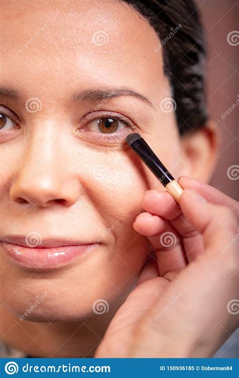 Closeup Of Beautiful Young Woman Face With Beauty Makeup