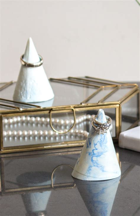 Look for jewelry organizers with trays and inserts to hold rings and divided. DIY Jewelry Organizer: Faux-Marble Ring Cone with FastCast ...