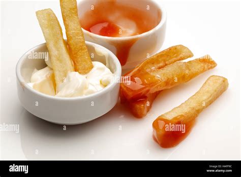 French Fries With Ketchup And Mayonnaise Stock Photo Alamy