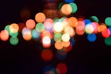 Blurry Light And Dots Glowing In The Dark Night Background Stock Image