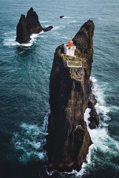 impossible heights lighthouse of thridrangar iceland beautiful lighthouse lighthouse