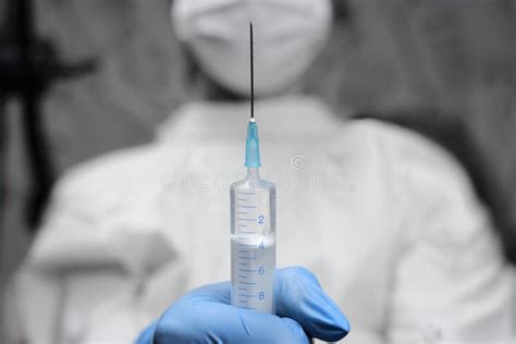 Syringe Medical Injection In Hand Palm Or Fingers Nurse Or Doctor
