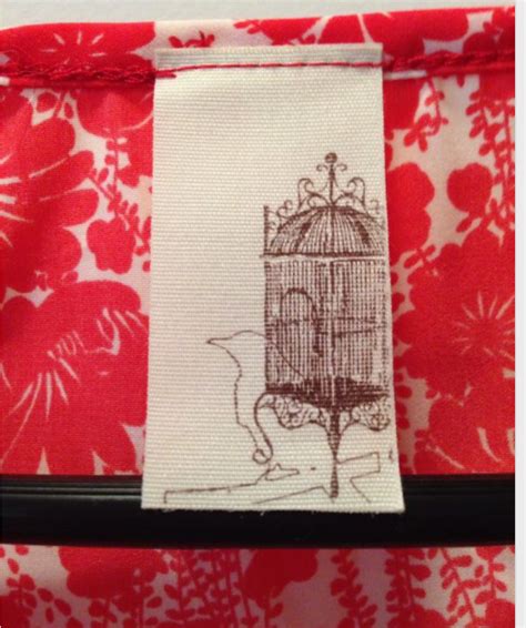 Help With This Brand Clothing Tag Has A Perched Bird And