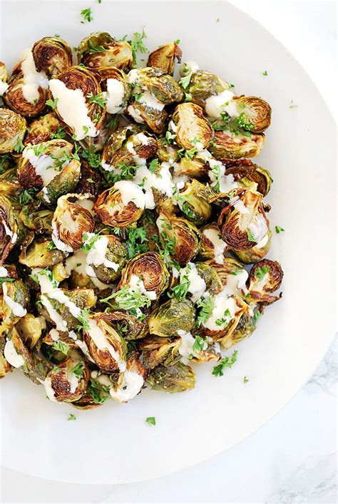 We've never been more excited to eat our veggies. Roasted Brussels Sprouts with Lemon Tahini Sauce | Recipe (With images) | Vegetable side dishes ...