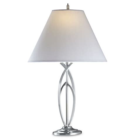 For a modern feel, consider bedroom light fixtures with exposed bulbs or brushed metal details. Curve Brushed Nickel Table Lamp | Bed Bath & Beyond