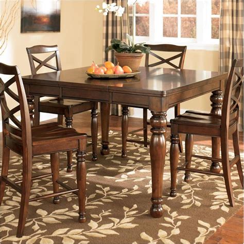 View all dining room furniture. D697-32 Ashley Furniture Rectangular Drm Counter Ext Table