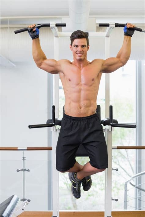 Shirtless Male Body Builder Doing Pull Ups Stock Photo Image Of Young