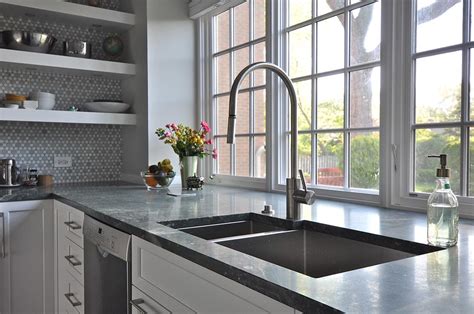 44 in. kitchen and dining area window locations. kitchen window bump out at counter hight or higher?