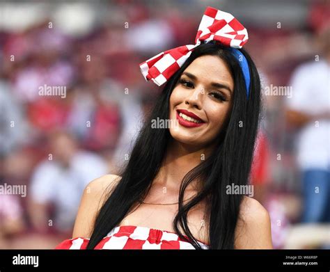 A Female Croatian Football Fan Poses To Show Support For Croatia Before