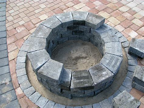 Watch the video of this step. Do-It-Yourself Fire Pit Installation Instructions and Grill Kit Recipes - Enhance Companies
