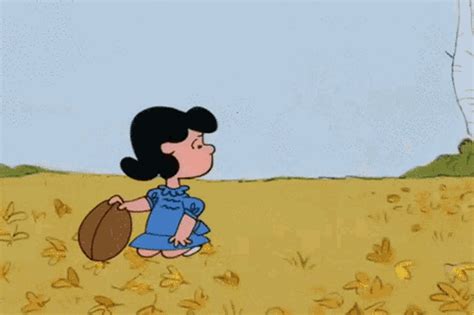 Charlie Brown Kicks Lucy Gifs Tenor
