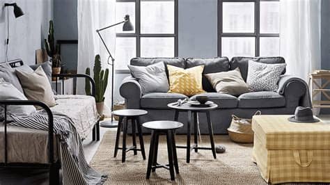 Minimalistic and luxury grey home interior with green velvet design sofa, gold coffe table with table lamp. Bedroom - IKEA