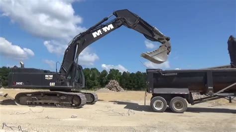 Cat excavators, lots of them! - YouTube