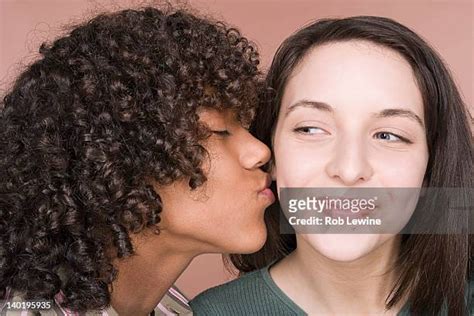 Black Girls Kissing White Girls Photos And Premium High Res Pictures