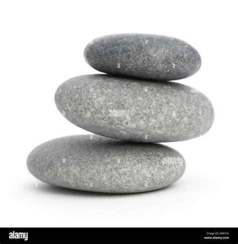 Three Pebbles Stacked One Onto Each Other 3 Stones Over White