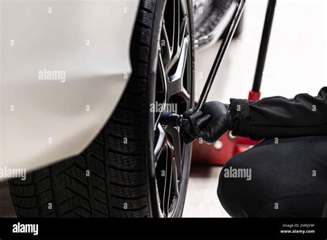 Man Car Service Worker Changing Wheel In Car Stock Photo Alamy