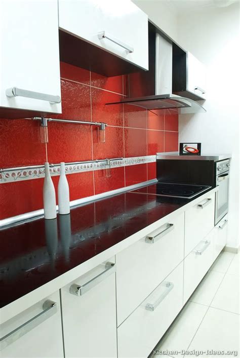For next photo in the gallery is cocinas rojo treinta ocho dise ardientes. #Kitchen Idea of the Day: Modern white kitchen with a red ...