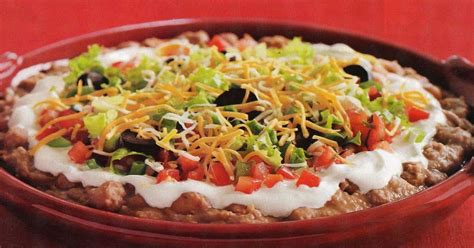 7 Layer Dip Refried Beans Taco Seasoning Sour Cream Salsa Lettuce