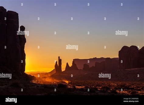 Totem Pole Rock Formation At Sunrise In Monument Valley Navajo Tribal