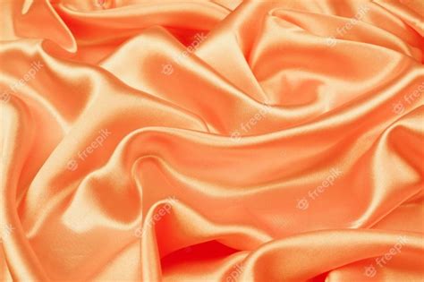 Premium Photo Beautiful Orange Silk Texture Luxurious Satin For