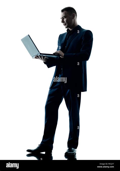 One Caucasian Business Man Computer Laptop Silhouette Isolated On White