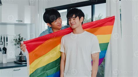 Asian Gay Couple Standing And Hugging Room At Home Young Handsome