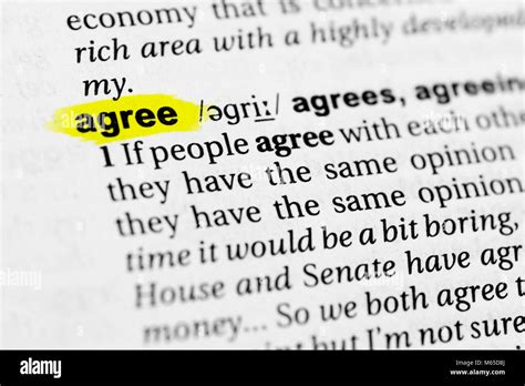 Highlighted English Word Agree And Its Definition In The Dictionary Stock Photo Alamy