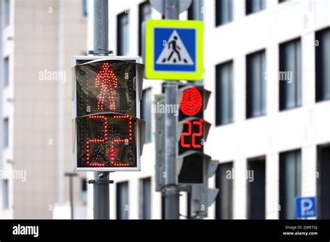 Red Traffic Lights On A City Street Countdown At The Pedestrian