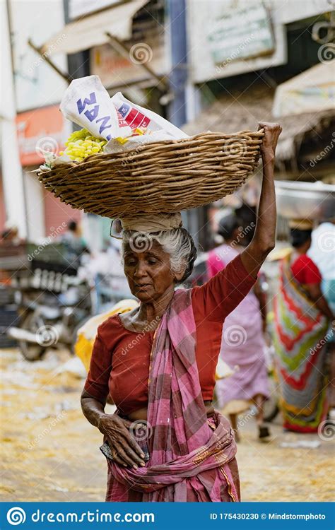 woman carries her load on her head editorial image image of female poverty 175430230