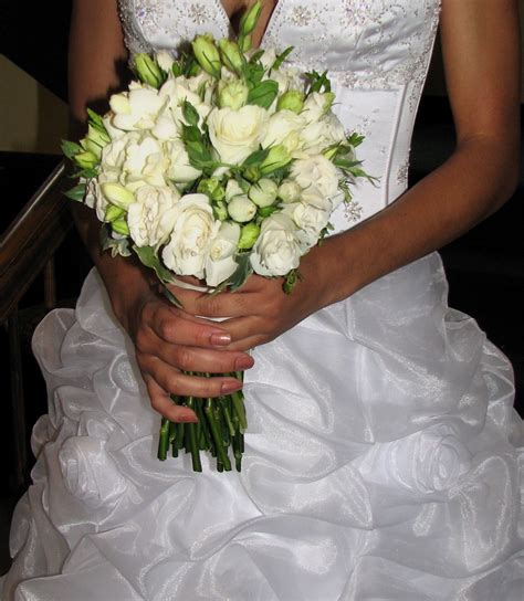 bridal bouquet with white roses freesia and lisianthus white roses bridal bouquet bouquet