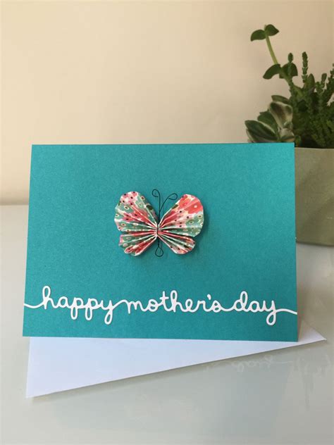 A Card With A Butterfly On It And The Words Happy Mothers Day