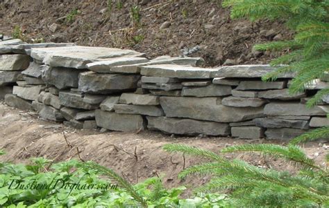 Build A Stacked Stone Garden Wall Stone Walls Garden Garden Stones