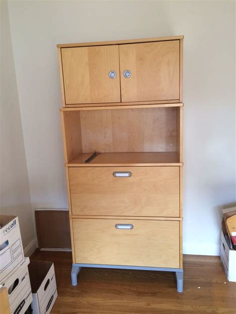 The shelves are adjustable so you can customise your storage as needed. IKEA office filing cabinet. Two file drawers plus open ...