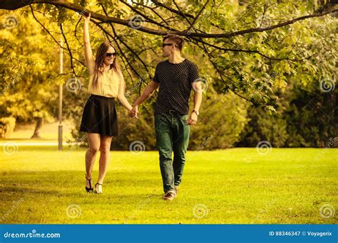 Couple Taking Walk Through Park Stock Image Image Of Affection